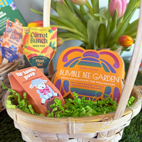 Limited edition Easter basket featuring seed packets for wildflowers, colorful packaging, and decorative grass.