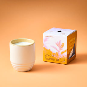 Garden Vibes Candle/Planter features a cream-colored ceramic container with a textured design and a box labeled "Golden Moments.