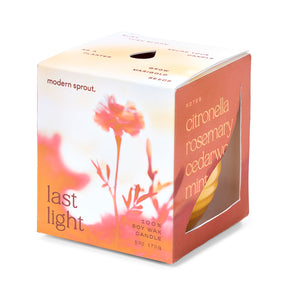 Garden Vibes Candle/Planter features a colorful box with floral design, showcasing a 100% soy wax candle and planter combo.