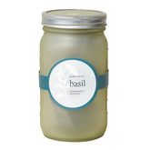 Green glass garden jar featuring a label for a basil hydroponic grow kit, designed for indoor gardening.