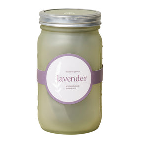 Green glass garden jar featuring a lavender label, designed for hydroponic growing kits. Ideal for indoor gardening.