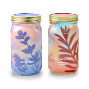 Two decorative jars labeled Lavender and Rosemary, designed for hydroponic herb growing, featuring colorful, botanical designs.