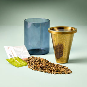 Agave Grow Kit featuring a blue container, a gold mesh pot, planting medium, and seed packets for easy cultivation.