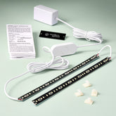Grow light repair kit featuring LED strips, power adapter, switch, and installation instructions on a light green background.