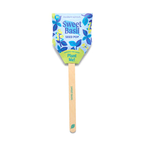 Colorful seed pop for Sweet Basil featuring a decorative label and a wooden stick for planting instructions.