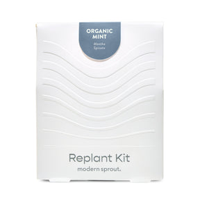 White packaging of the Immersion Hydroponic Replant Kit featuring organic mint, labeled with the plant name and brand.