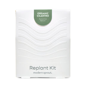 White packaging of the Immersion Hydroponic Replant Kit featuring organic cilantro, labeled with plant name and brand.