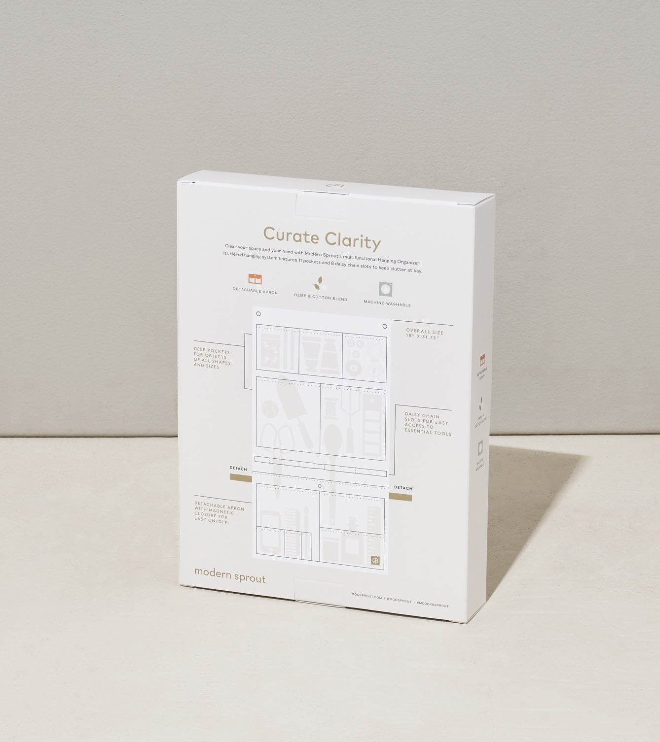 Hanging organizer and apron packaging featuring illustrations and instructions for use, designed for efficient storage solutions.