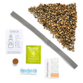 Passive Hydroponic Replant Kit components including a garden jar, growing medium, fertilizer, and seed packets.
